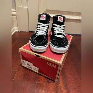 Vans Black & White High Top Sneakers. Size: 10.5